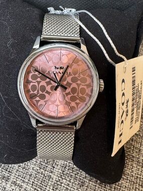Coach Women's Silver Mesh Watch with Pink Logo Dial
